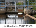 Detail of an old hydropower plant in the center of Kaustinen on a summer day.