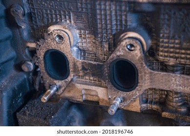 Detail Of Old And Rusty Car Engine In A Workshop