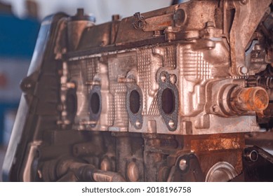 Detail Of Old And Rusty Car Engine In A Workshop