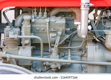 Detail Of Old Tractor Machine Or Engine. Whit Visible Fuel Pump, Air Compressor, Fuel Filter And Exhaust Pipe.