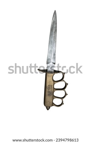 Detail of an old US - LFC model M1 1918 American trench knife from the Second World War, the handle includes a brass knuckle. on white background