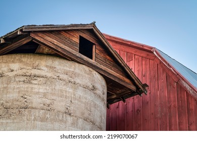 Detail Of Old, Weathered, Red Barn Against Dusk Sky At Colorado Foothills