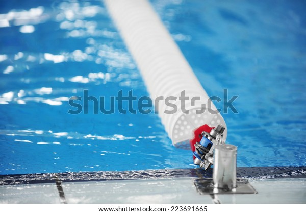 Detail\
with a olympic swimming pool lane divider\
system