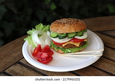 Detail On Bamboo Disposable Finger Food Sticks On Chinet Disposable Plate With Homemade Hamburger And Vegetable On Wooden Table, Concep Takeaway Food, Eco Friendly, Space For Text