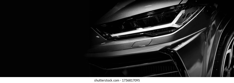 Detail on one of the LED headlights super car.copy space