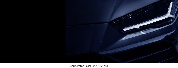 Detail on one of the LED headlights super car. copy space	