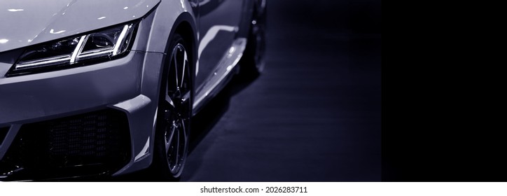 Detail on one of the LED headlights modern car on black background	 - Powered by Shutterstock