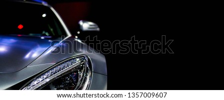 Detail on one of the LED headlights super car for copy space