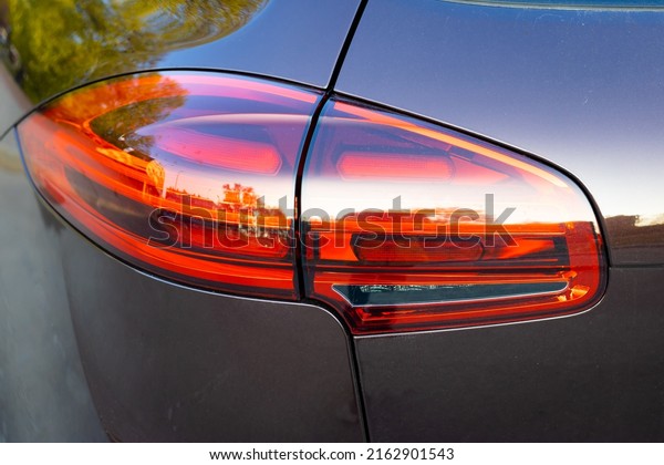 Detail on the Rear Brake Light of a Car. Grey
Car Rear Tail Light Close up
Background