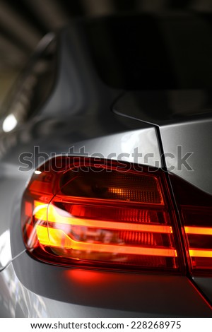 Detail on the rear light of a car.