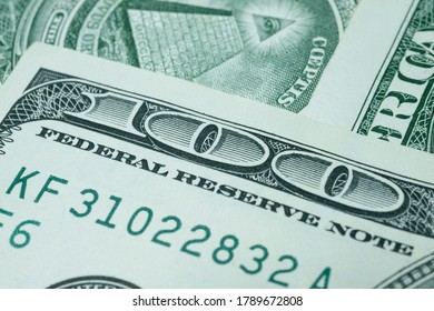 Detail  Of The One Hundred USA Dollar Banknote With Number 100 Close Up And Writing Federal Reserve Note