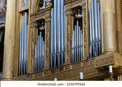 Detail of a pipe organ inside a church in Italy