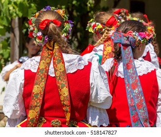 Detail Of Polish Folk Costume For Woman With Multicolored Embroidery.