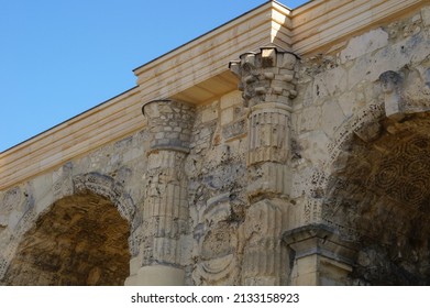 Detail of the Porte de Mars (Gate of Mars), a 3th century vestige, and an ancient Roman triumphal arch, currently located at the end of the Hautes Promenades, in Reims, in the Northeast of France - Shutterstock ID 2133158923
