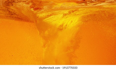 Detail of pouring beer creating twister shape, abstract refreshment background. - Shutterstock ID 1913770333