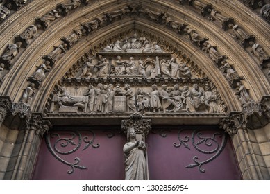 Detail Of The Principal Door Of Notre-Dame Cathedral