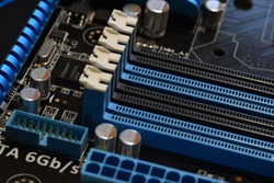 Detail of RAM memory connector slot on modern PC computer motherboard., an Industrial Photo by Dan74