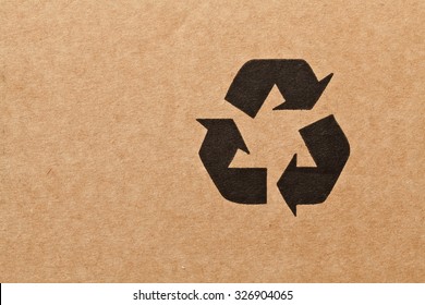 detail of recycle symbol on cardboard - Shutterstock ID 326904065