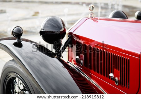 detail of a red vintage car