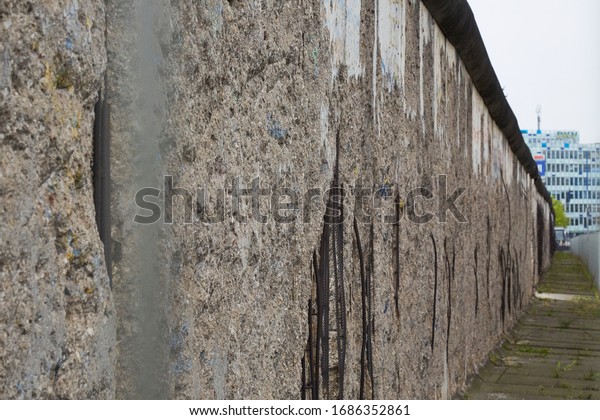 Detail of the remains of the\
Berlin Wall, Berlin, Germany. The segments of the wall were a\
reminder of the events that led to the fall of the wall in November\
1989.