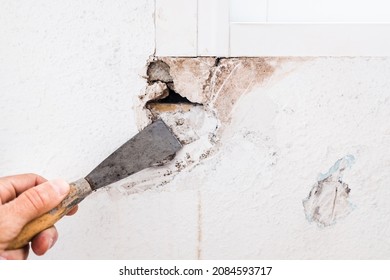 Detail Of The Repair Of A Hole In The Wall Of The Living Room Using Filling Mass.