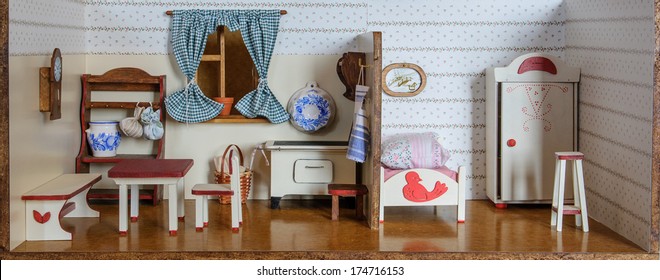 Detail Of Retro Kitchen And Bedroom In Doll House 