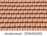 Detail of a roof with tile called marseilles, the first global roofing standard - Roof with double pitch and self-fitting flat tiles, Marseille model.