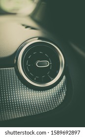 Detail Of A Round Air Vent Inside A Car.