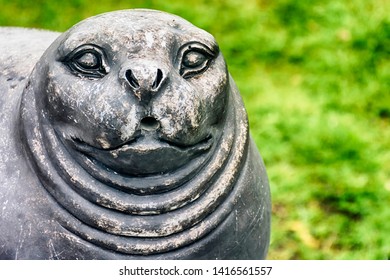 Detail Of The Sculpture Symbol Of The City Of Savonlinna, Seal, Endemic Lake Saimaa, In The Blurred Background. Finland