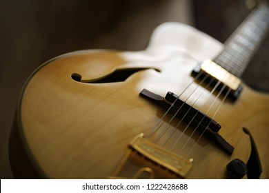 Detail of a semi-acoustic jazz guitar.