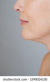 A Detail Of A Senior Woman's Face, Left Cheek And Jawline