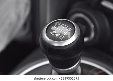 Detail of the shift lever from a Subaru car
