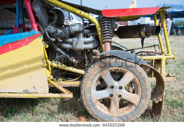  detail of\
shock absorber of buggy car off\
road