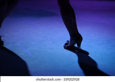 Detail Of Shoes With Shadows In Milonga Ballroom.