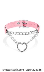 Detail shot of pink leather choker with metal chains, rings and steel heart. Stylish adjustable choker with metal buckle is isolated on the white background.  