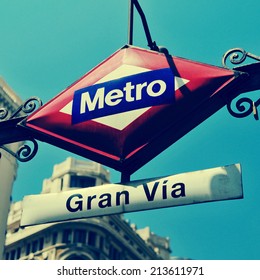 detail of the sign of Gran Via metro station in Madrid, Spain, with a retro effect