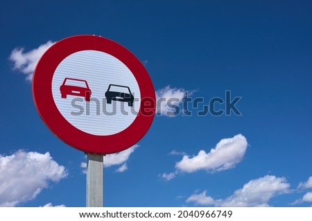 detail of a sign prohibiting overtaking on the highway