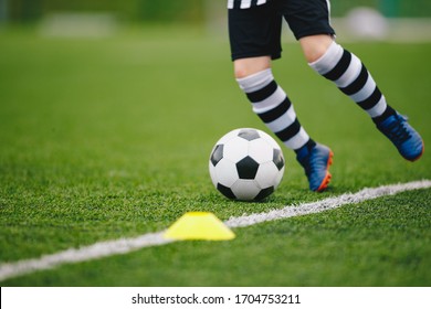 soccer ball and cleats