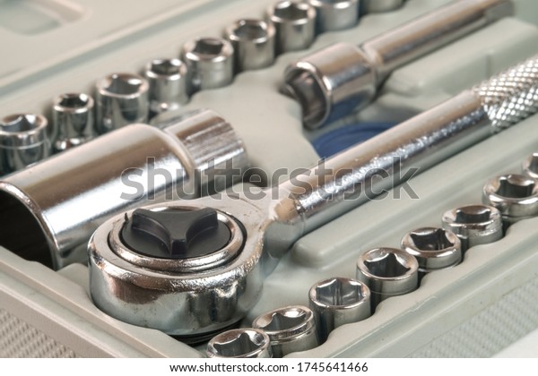 Detail of the socket spanner wrench and various\
wrench heads in the\
toolbox