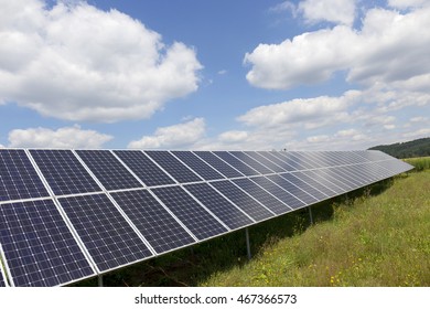 Detail of the Solar Power Station on the summer flowering Meadow  - Shutterstock ID 467366573