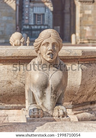 Detail of the sphinx of Fontana Contarini, historic fountain located in Piazza Vecchia in the Upper City (città alta) of Bergamo. Very sharp and detailed image on a slightly out of focus background