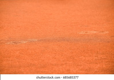 Detail With Sport Shoe Footprints On A Tennis Clay Court