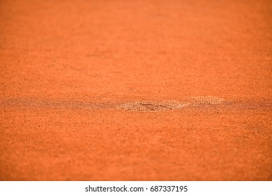 Detail With Sport Shoe Footprints On A Tennis Clay Court