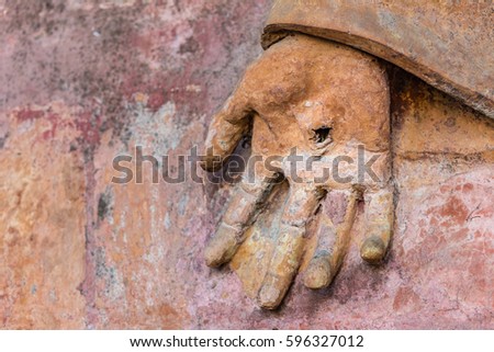 detail of statue with hand with the stigmata