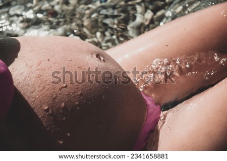 Similar – Image, Stock Photo Unrecognizable pregnant woman diving in sea