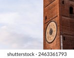 Detail of Torrazzo, the symbolic bell tower of Cremona.