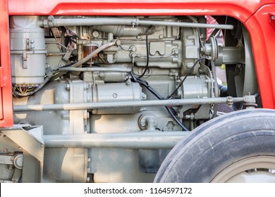 Detail Of Tractor Machine Or Engine. Whit Visible Fuel Pump, Engine Starter, Oil Filter And Generator.