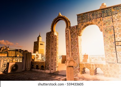 Detail Of Traditional Arabic Architecture In Cityscape At Dawn With Dramatic Sunlight. Tunisia, North Africa.