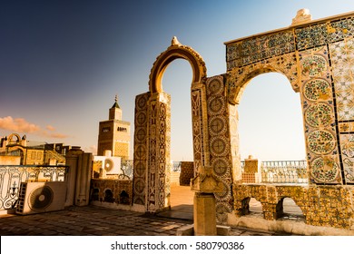 Detail Of Traditional Arabic Architecture In Cityscape At Dawn With Dramatic Sunlight. Tunisia, North Africa.