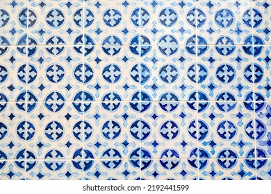 Detail of the traditional tiles azulejos from facade of old house in Lisbon Portugal